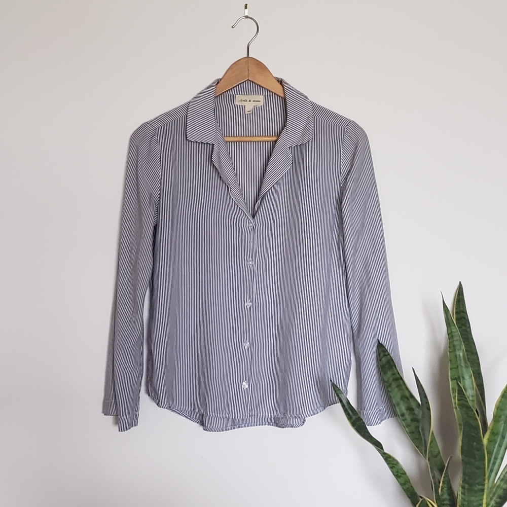 Button up shirt with bell sleeves.